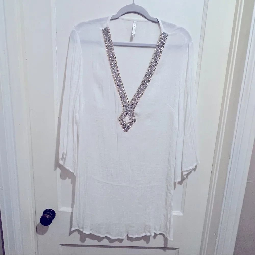 Elegant White Tunic with Silver Accents